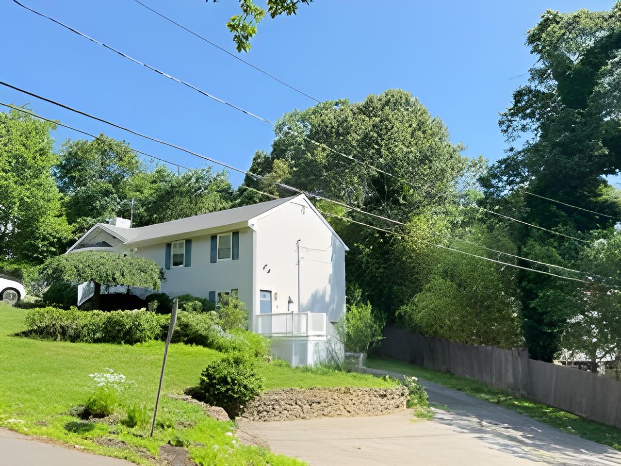60 Aloma Road Rocky Point, NY 11778 - Photo 26 of 34 a front view of a house with a yard
