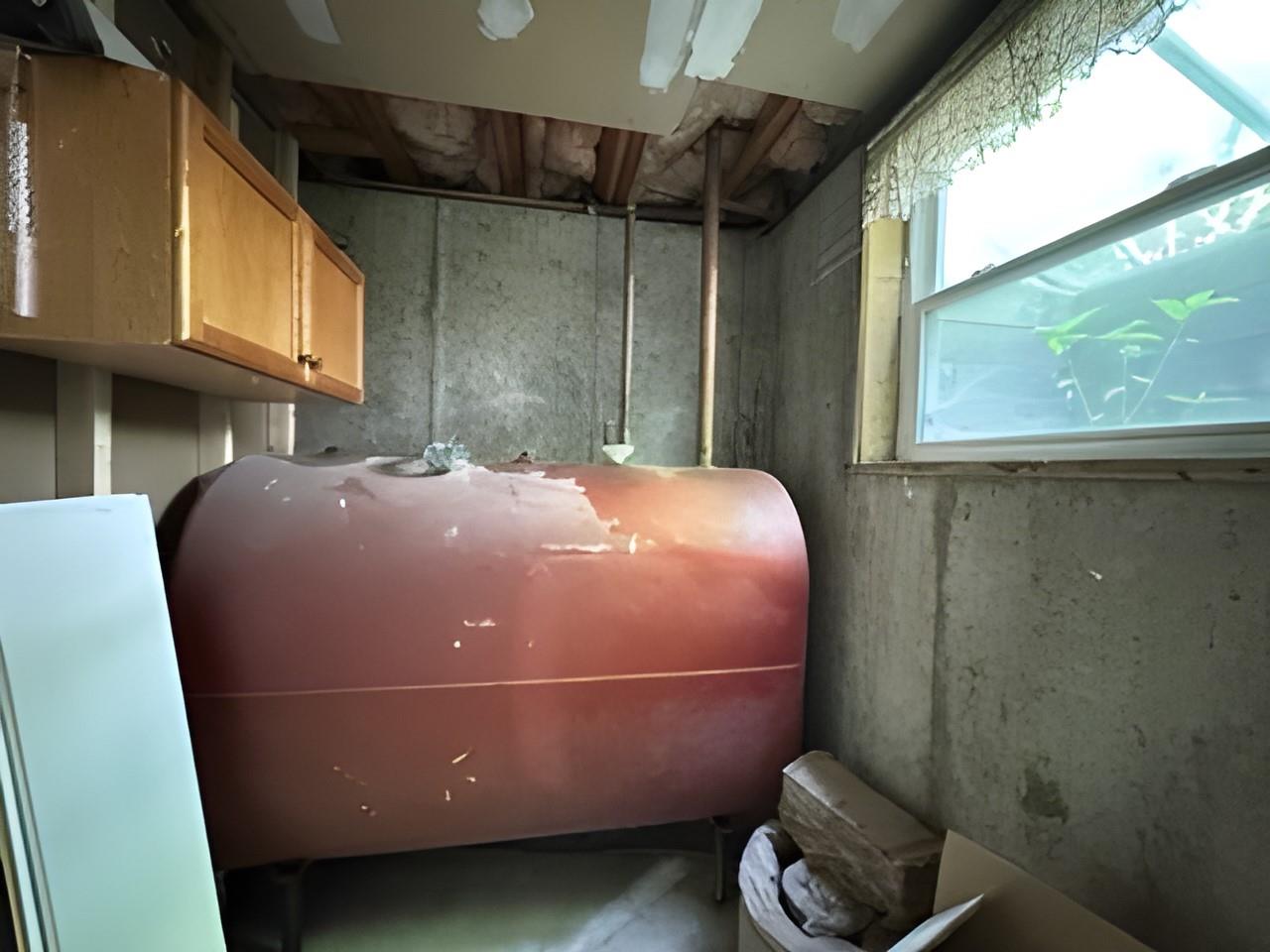 60 Aloma Road Rocky Point, NY 11778 - Photo 28 of 34 a bedroom with a bed and a window