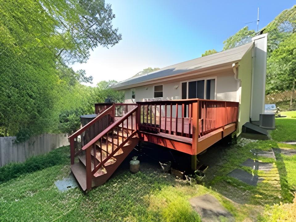 60 Aloma Road Rocky Point, NY 11778 - Photo 30 of 34 a view of a house with a yard deck and a garden