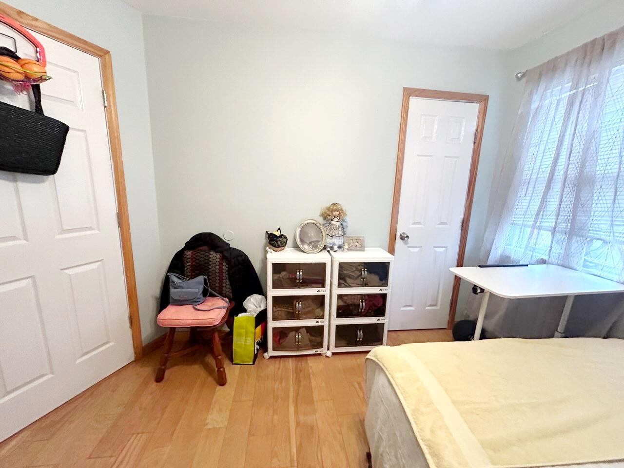 60 Aloma Road Rocky Point, NY 11778 - Photo 4 of 34 a living room with furniture and a flat screen tv