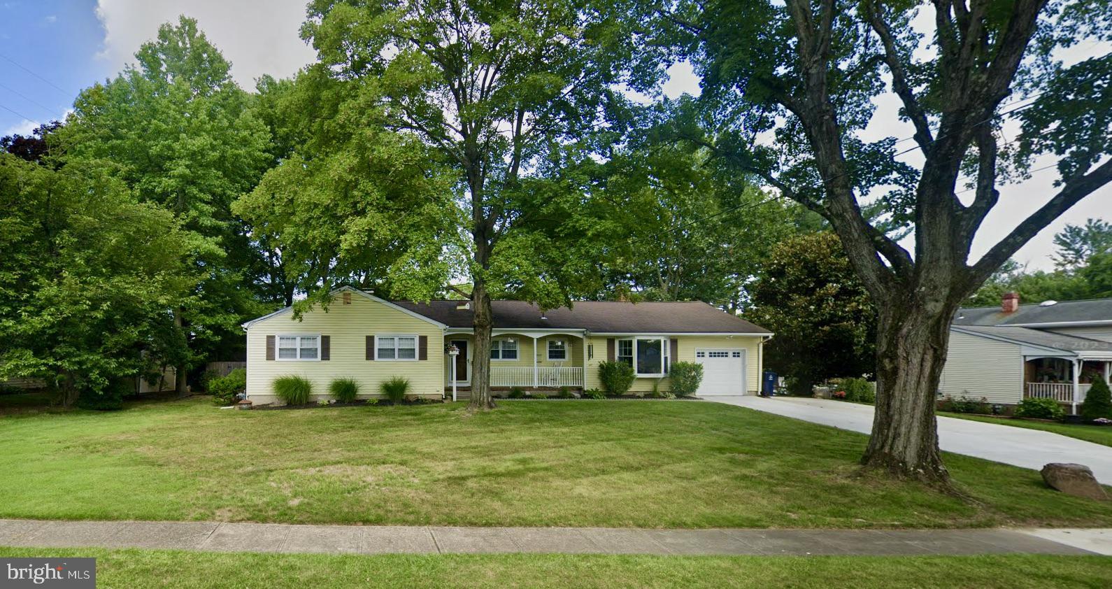 5 Royal Oak Road Lawrence Township, NJ 08648 - Photo 2 of 53 Charming home with lush greenery.