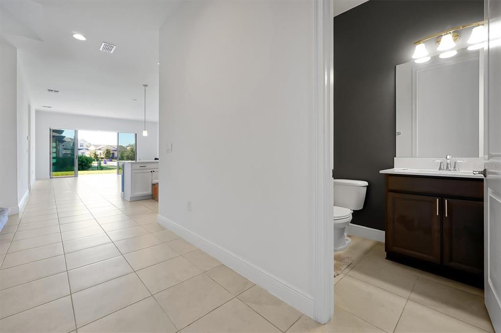 5200 Myrtleleaf Court St. Cloud, FL 34772 - Photo 15 of 59 a bathroom with a sink and a toilet