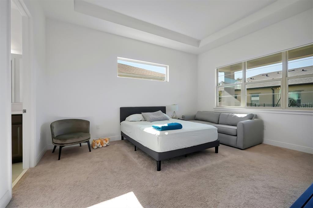 5200 Myrtleleaf Court St. Cloud, FL 34772 - Photo 16 of 59 a living room with furniture and a air conditioner vent
