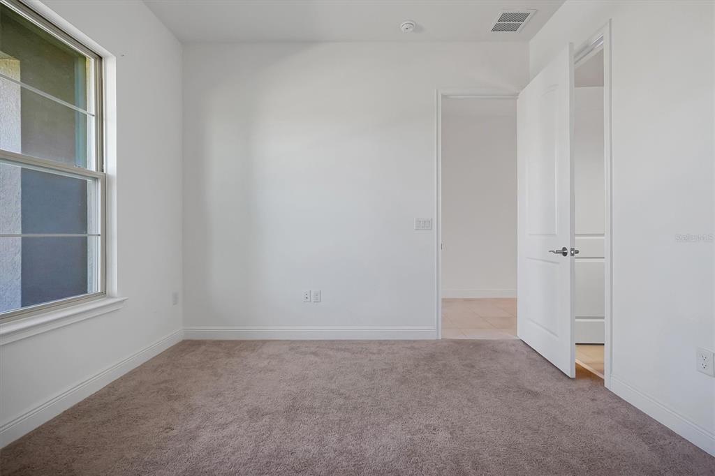 5200 Myrtleleaf Court St. Cloud, FL 34772 - Photo 23 of 59 a view of an empty room