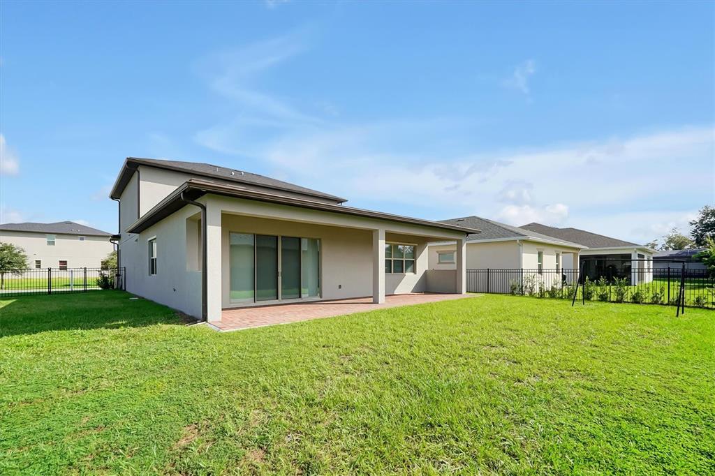5200 Myrtleleaf Court St. Cloud, FL 34772 - Photo 39 of 59 a front view of a house with a yard