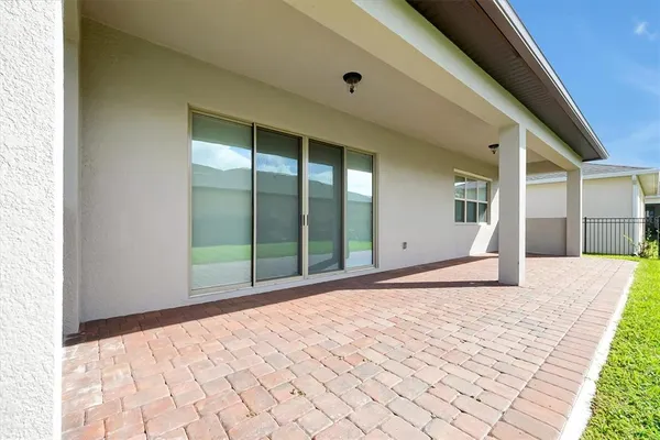 an aerial view of a city and lake view