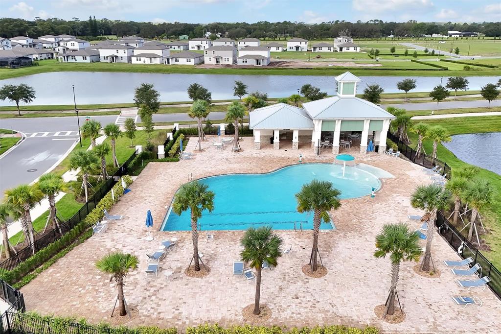5200 Myrtleleaf Court St. Cloud, FL 34772 - Photo 50 of 59 a view of a lake with a mountain view