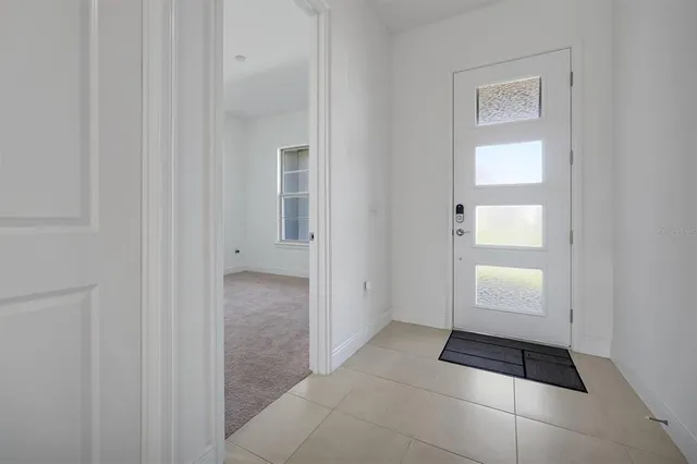 a view of a closet area with living room