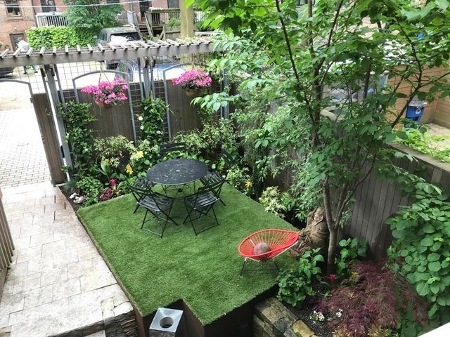 a outdoor view with a table and chairs