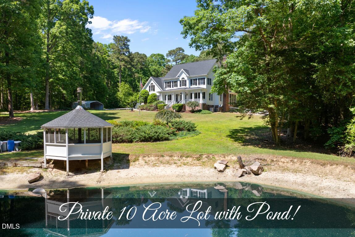 4121 Granite Ridge Trail Raleigh, NC 27616 - Photo 1 of 45 Front with Pond