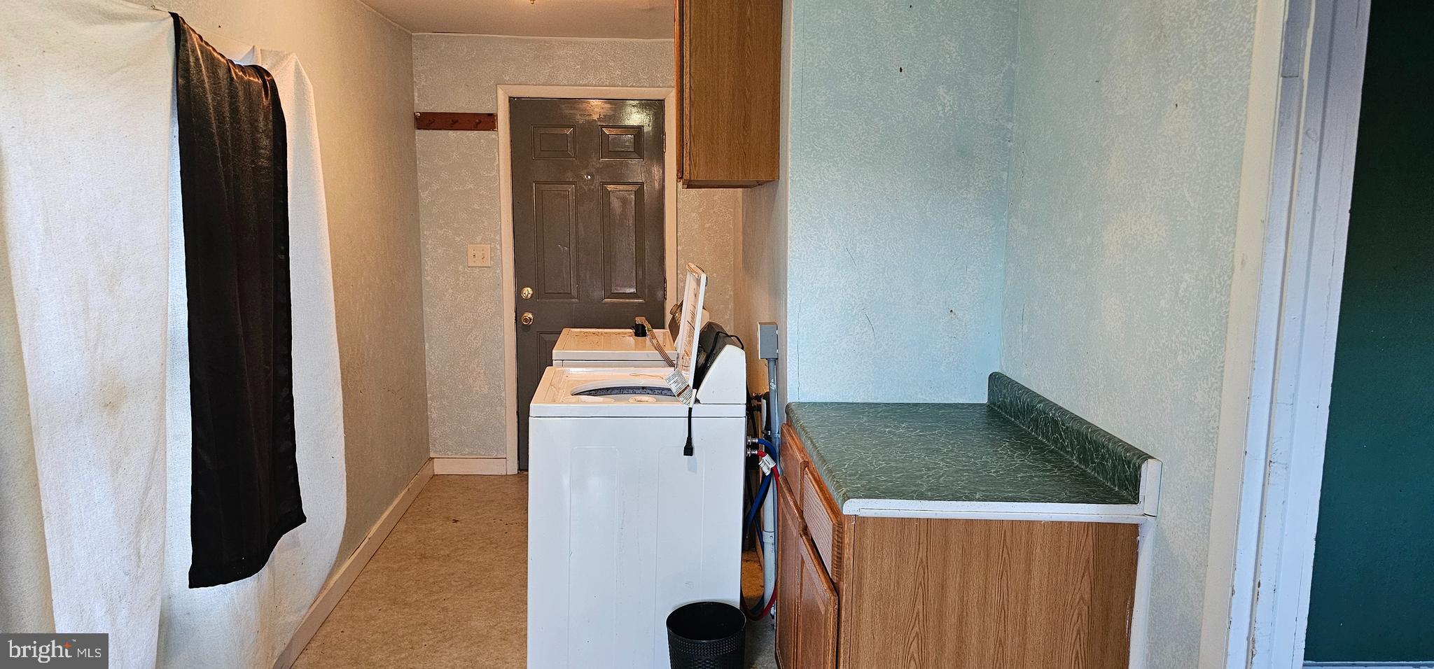 364 Main Street Little Creek, DE 19901 - Photo 15 of 21 a utility room with dryer and washer