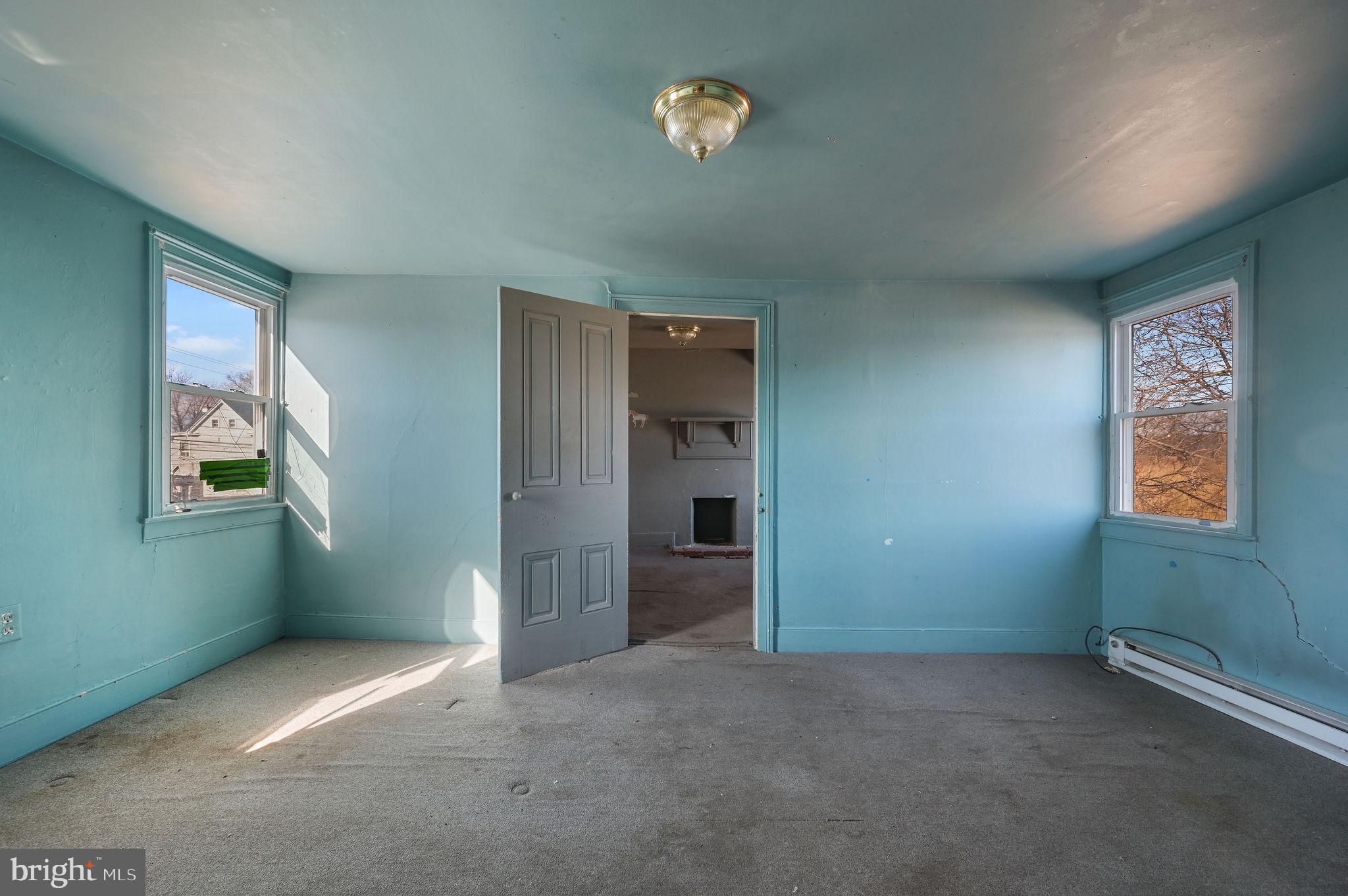 364 Main Street Little Creek, DE 19901 - Photo 20 of 21 an empty room with windows and closet