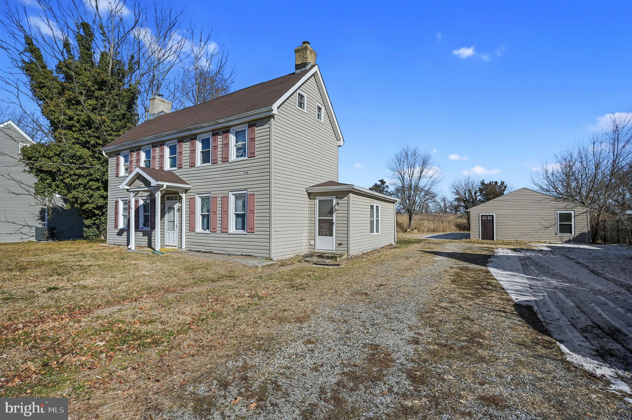 364 Main Street Little Creek, DE 19901 - Photo 2 of 21 a view of a house with a yard and tree s