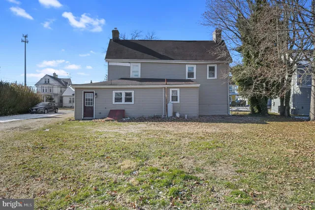 a view of a backyard of the house