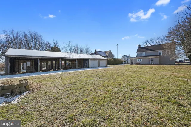 a kitchen with a sink cabinets and window