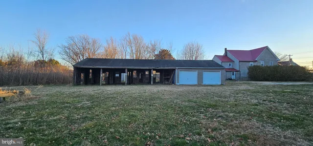 a kitchen with a refrigerator and a sink