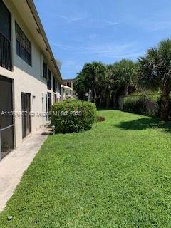Crystal Lake Deerfield Beach, FL 33064 - Photo 6 of 13 a view of backyard of house with green space