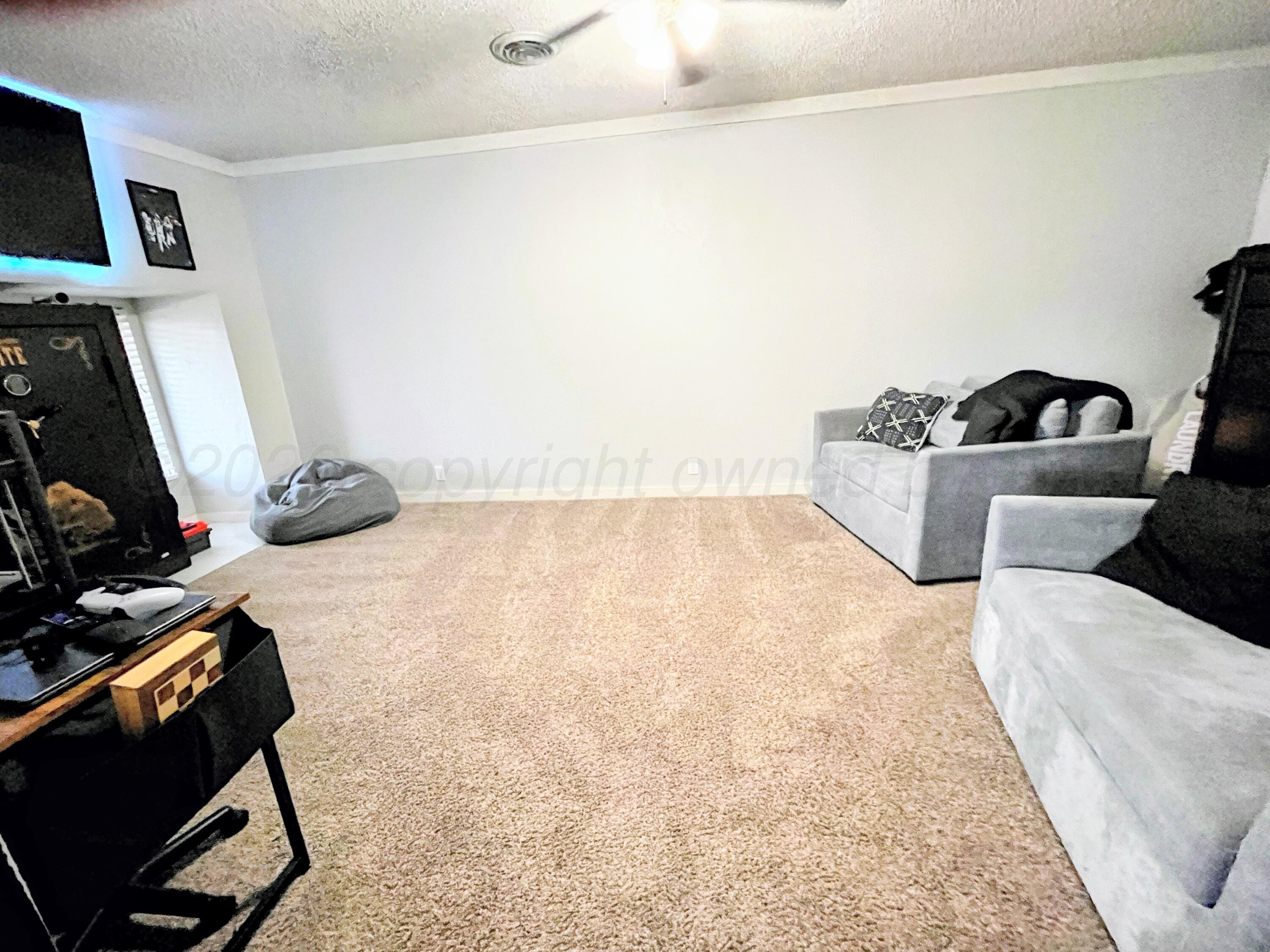 909 Michigan Street Perryton, TX 79070 - Photo 3 of 18 909 Michigan game room