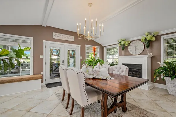 an aerial view of house with yard swimming pool and outdoor seating