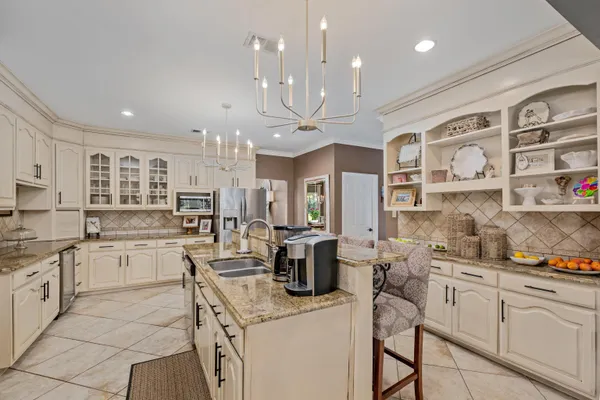 a view of a house with a yard and garage