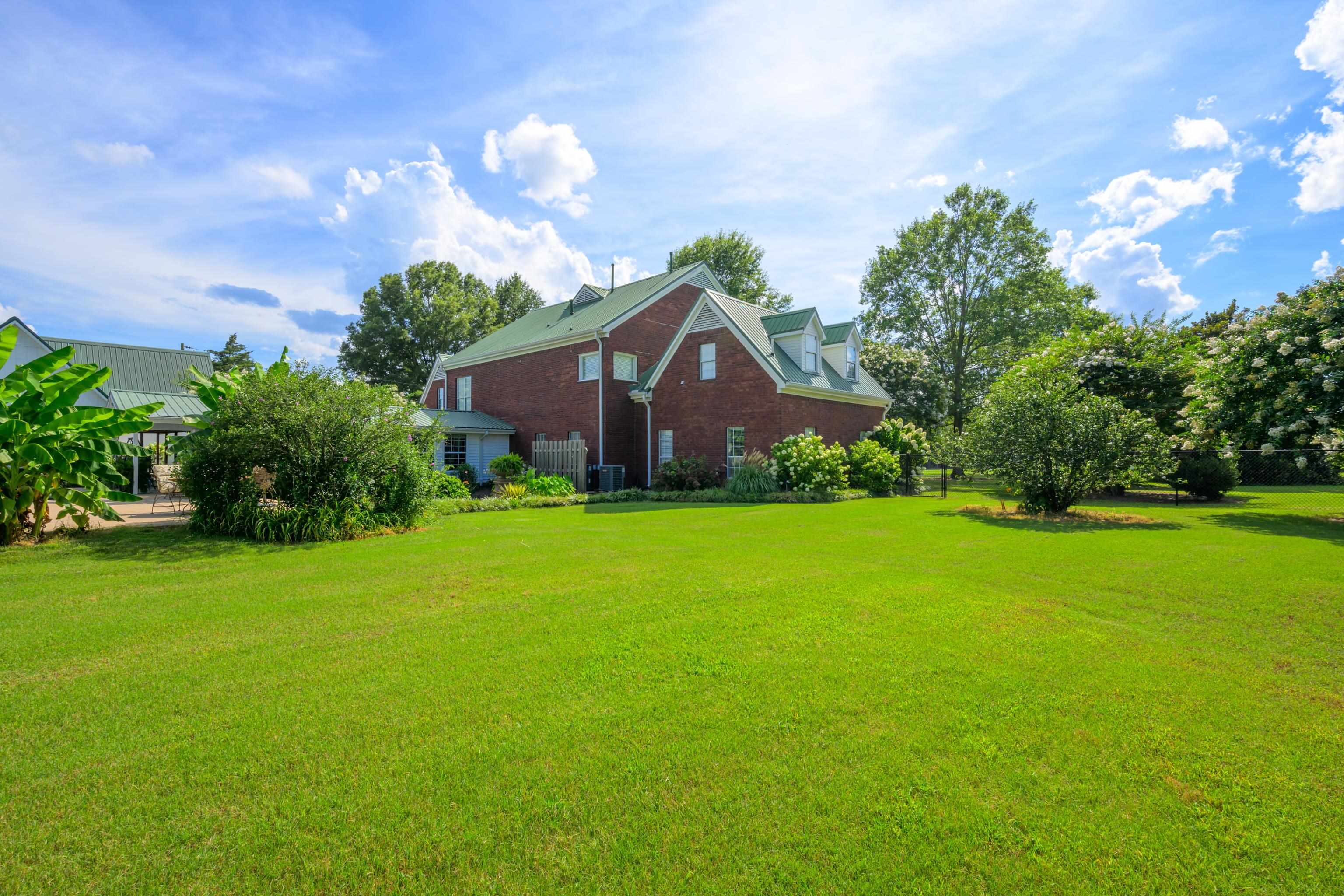 1354 Wilburn Road Michigan City, MS 38647 - Photo 16 of 40 a view of a house with a big yard