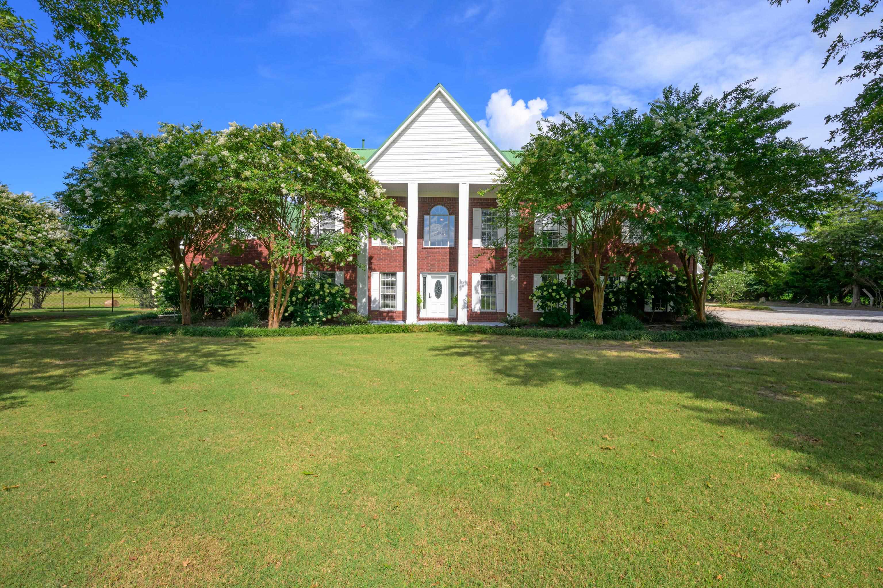 1354 Wilburn Road Michigan City, MS 38647 - Photo 2 of 40 a front view of a house with a yard