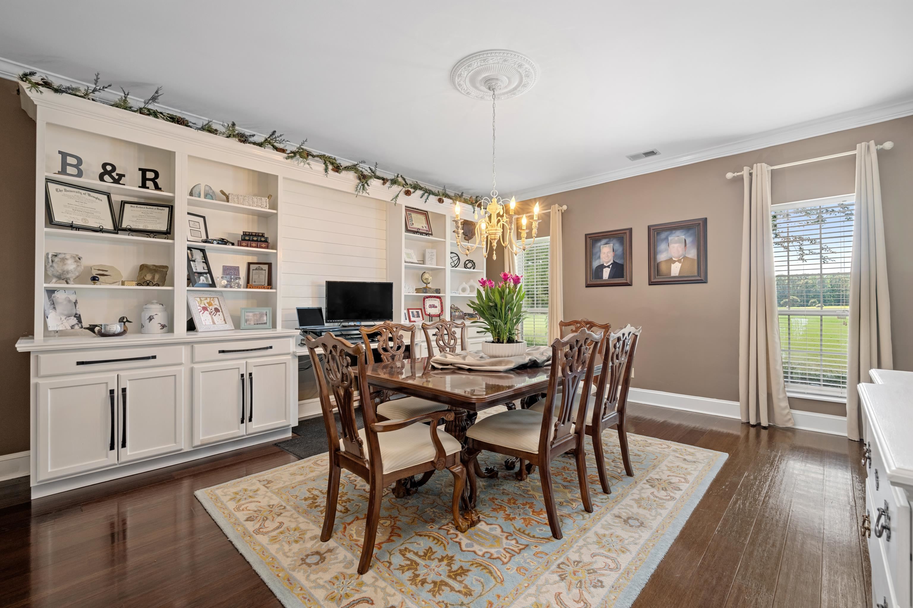 1354 Wilburn Road Michigan City, MS 38647 - Photo 29 of 40 a view of a dining room with furniture window and wooden floor