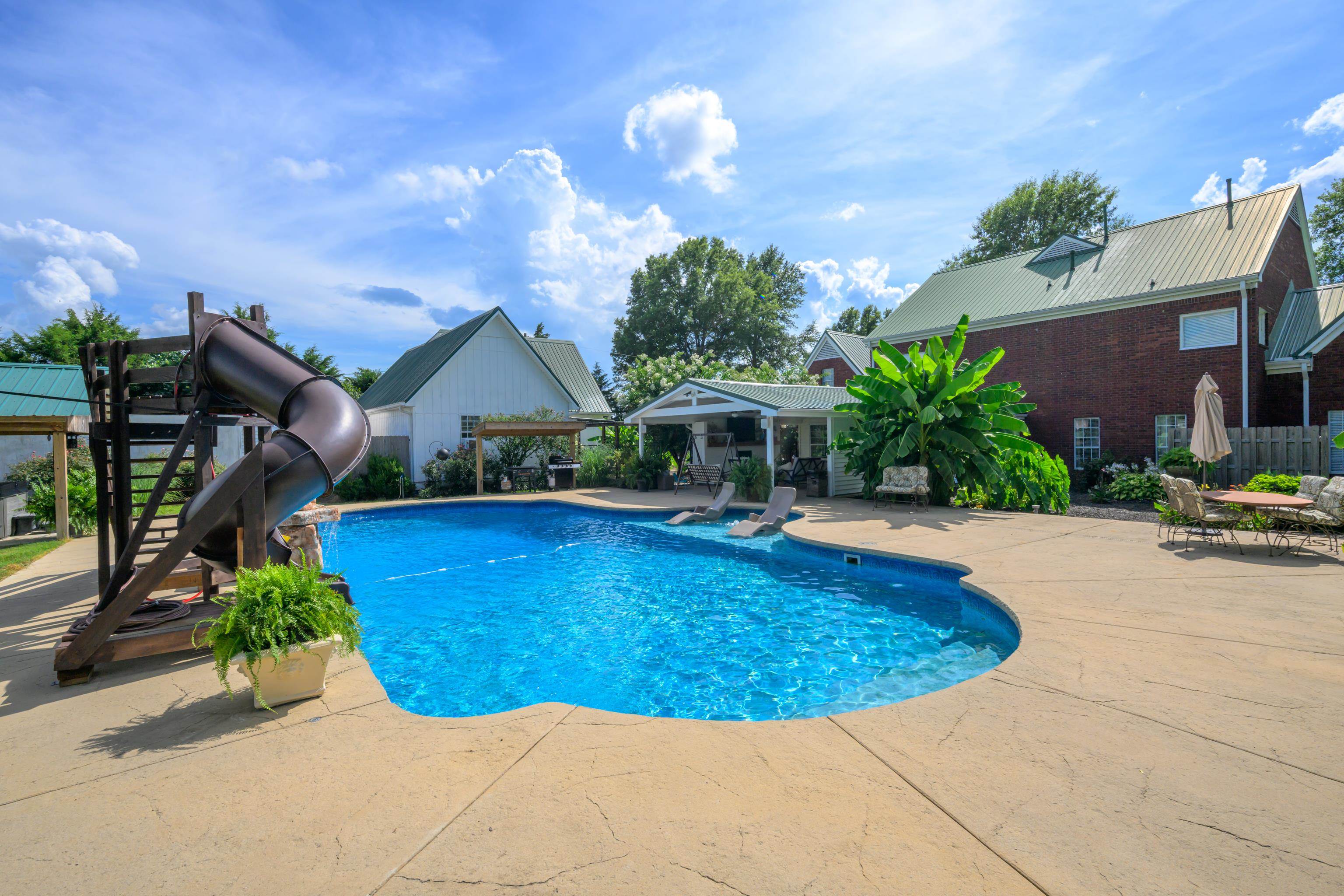 1354 Wilburn Road Michigan City, MS 38647 - Photo 32 of 40 a view of a house with swimming pool yard and sitting area