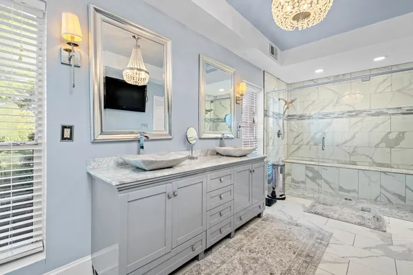 a view of a livingroom with furniture and a fireplace