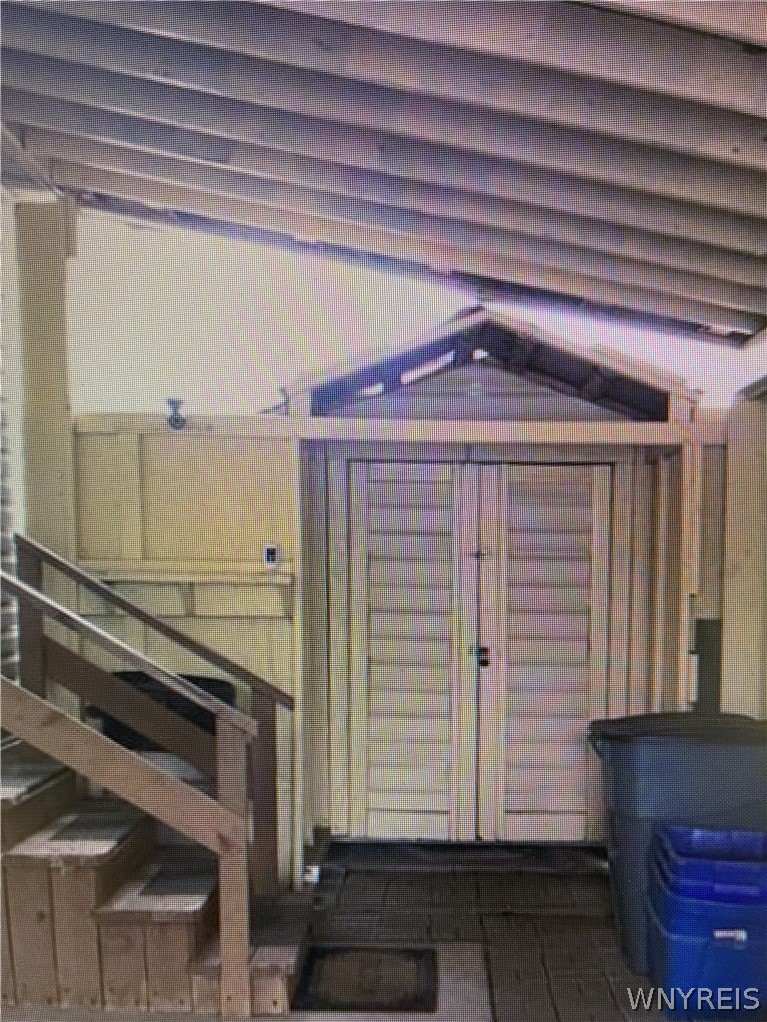 6035 South Transit Road Lockport Town, NY 14094 - Photo 25 of 32 SHED AS IS-PAINTED BACK STEPS TO BACK HALL