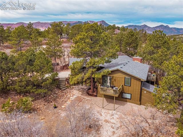 7175 Higher Ridges Court Colorado Springs, CO 80919 - Photo 46 of 50 Aerial view with a mountain view