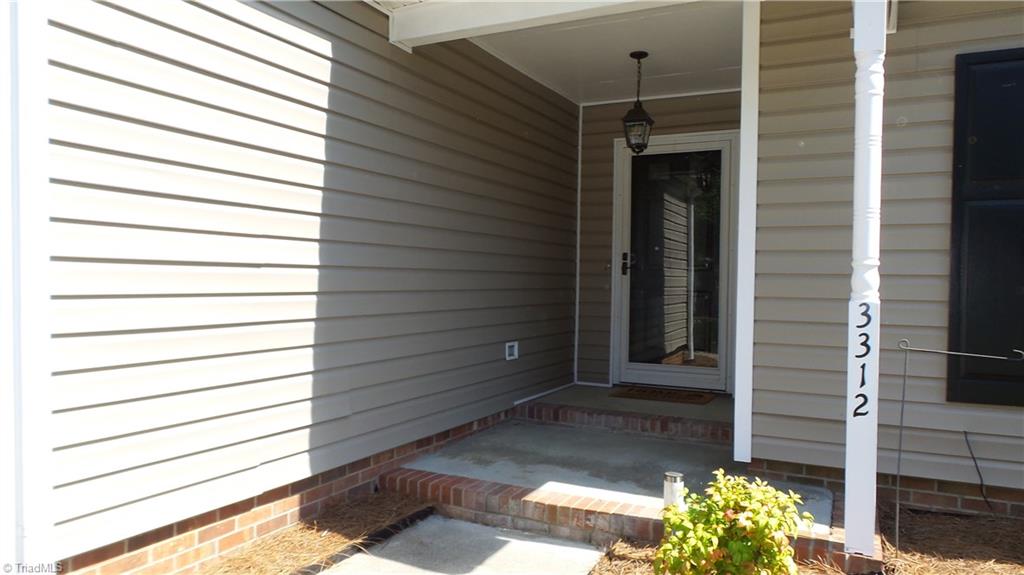 3312 Timberwolf Avenue High Point, NC 27265 - Photo 1 of 29 Covered Entryway with Storm Door.