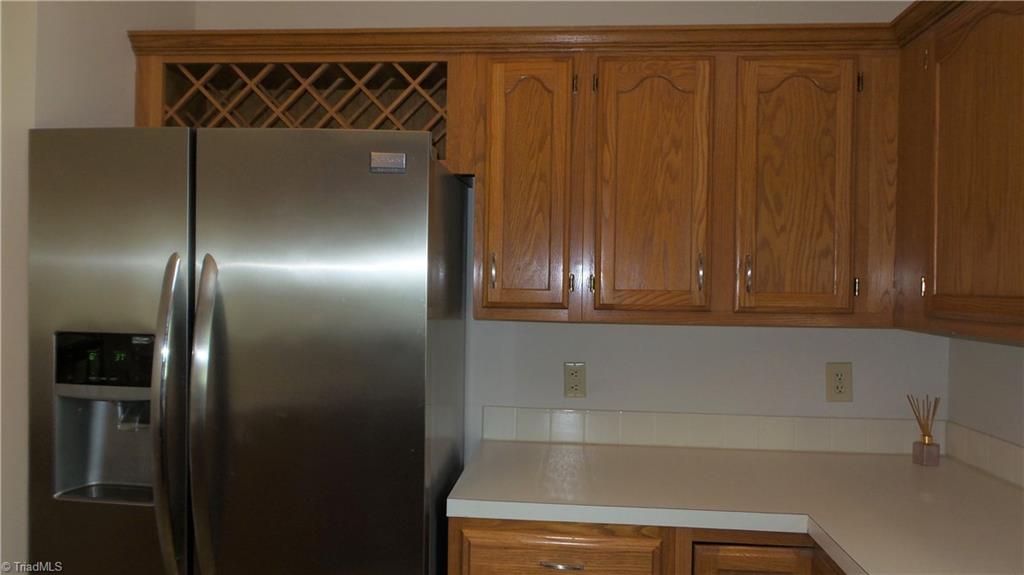 3312 Timberwolf Avenue High Point, NC 27265 - Photo 11 of 29 Wine Rack over Refrigerator. Kitchen also has a Pantry.