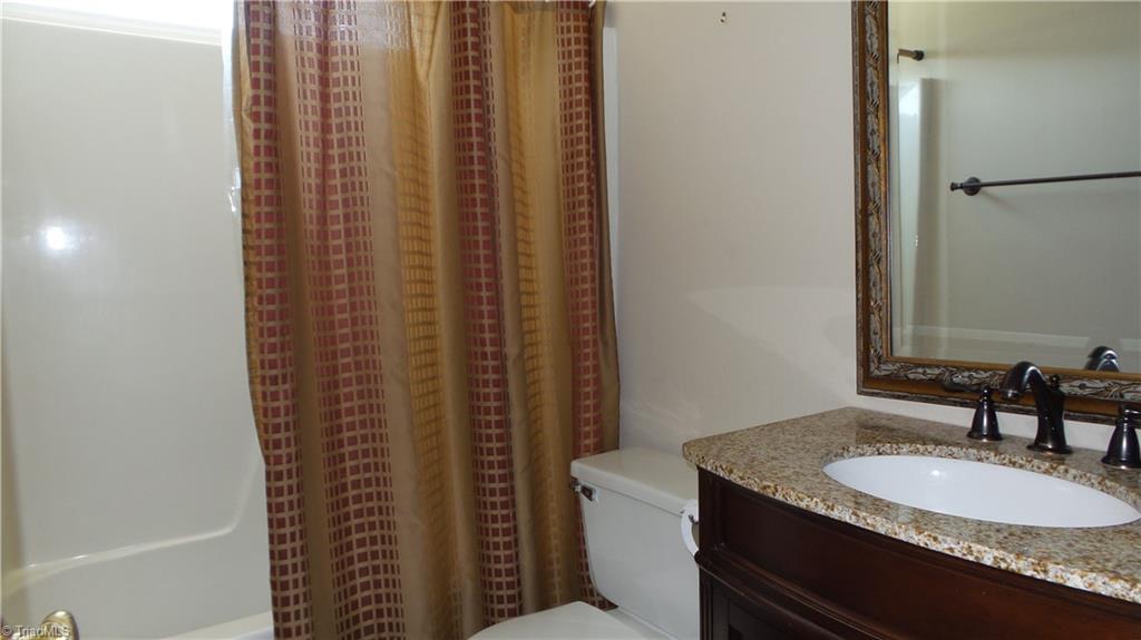 3312 Timberwolf Avenue High Point, NC 27265 - Photo 19 of 29 Hall bath with Newer vanity and transom window.