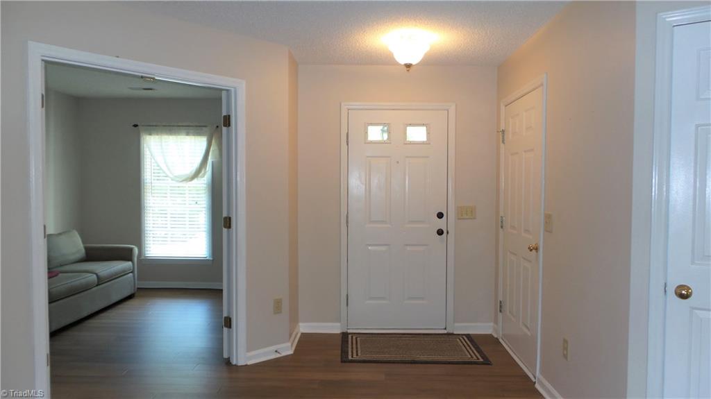 3312 Timberwolf Avenue High Point, NC 27265 - Photo 2 of 29 Foyer entry with entrance to Garage. Double doors to 3rd Bedroom.