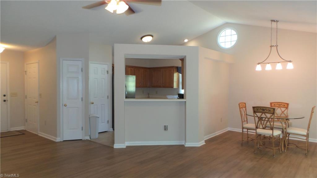 3312 Timberwolf Avenue High Point, NC 27265 - Photo 8 of 29 View of Kitchen opening and vaulted ceiling over Kitchen and Dining Room.