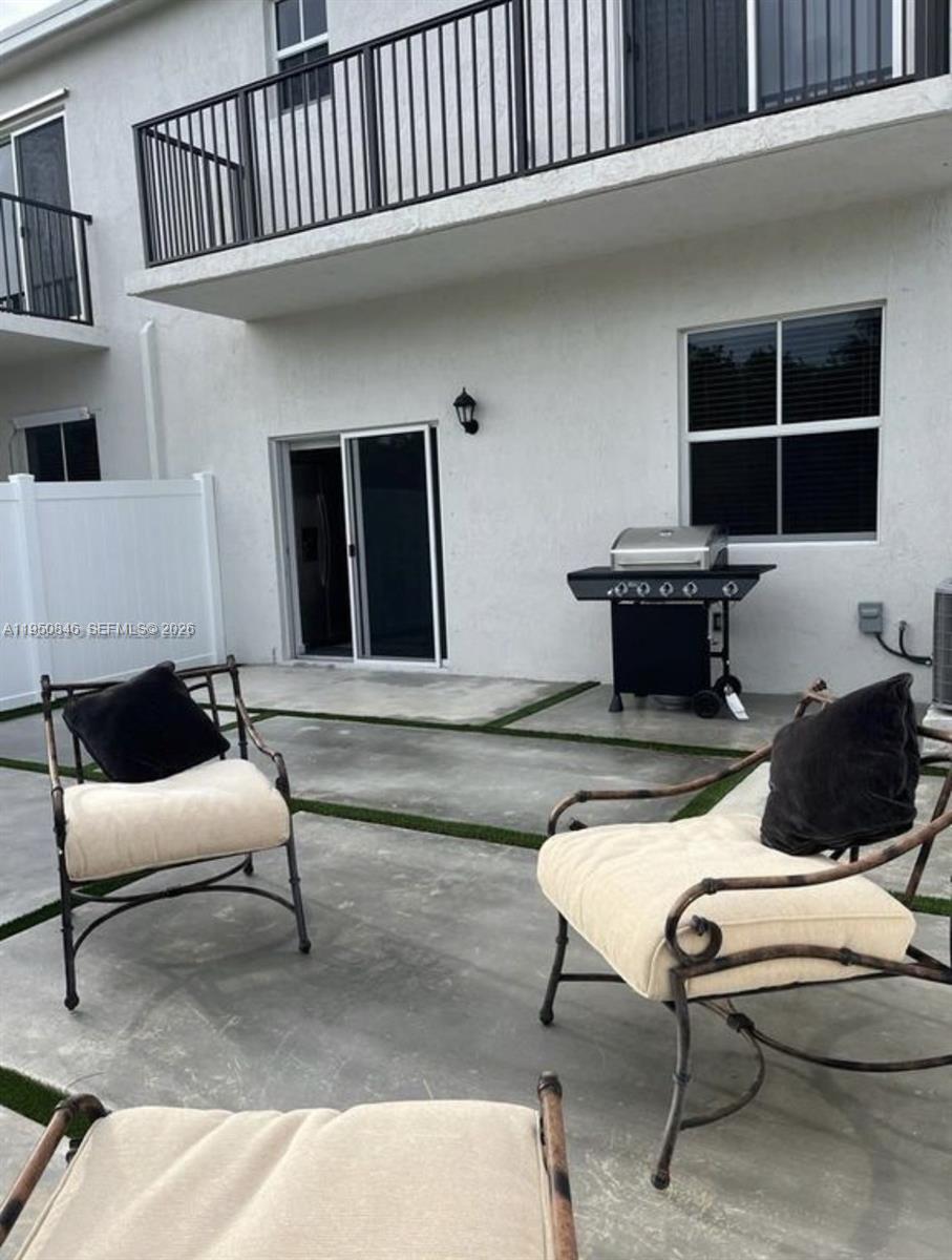 784 Southeast 19th Street, Unit 784 Homestead, FL 33034 - Photo 16 of 22 a living room with furniture