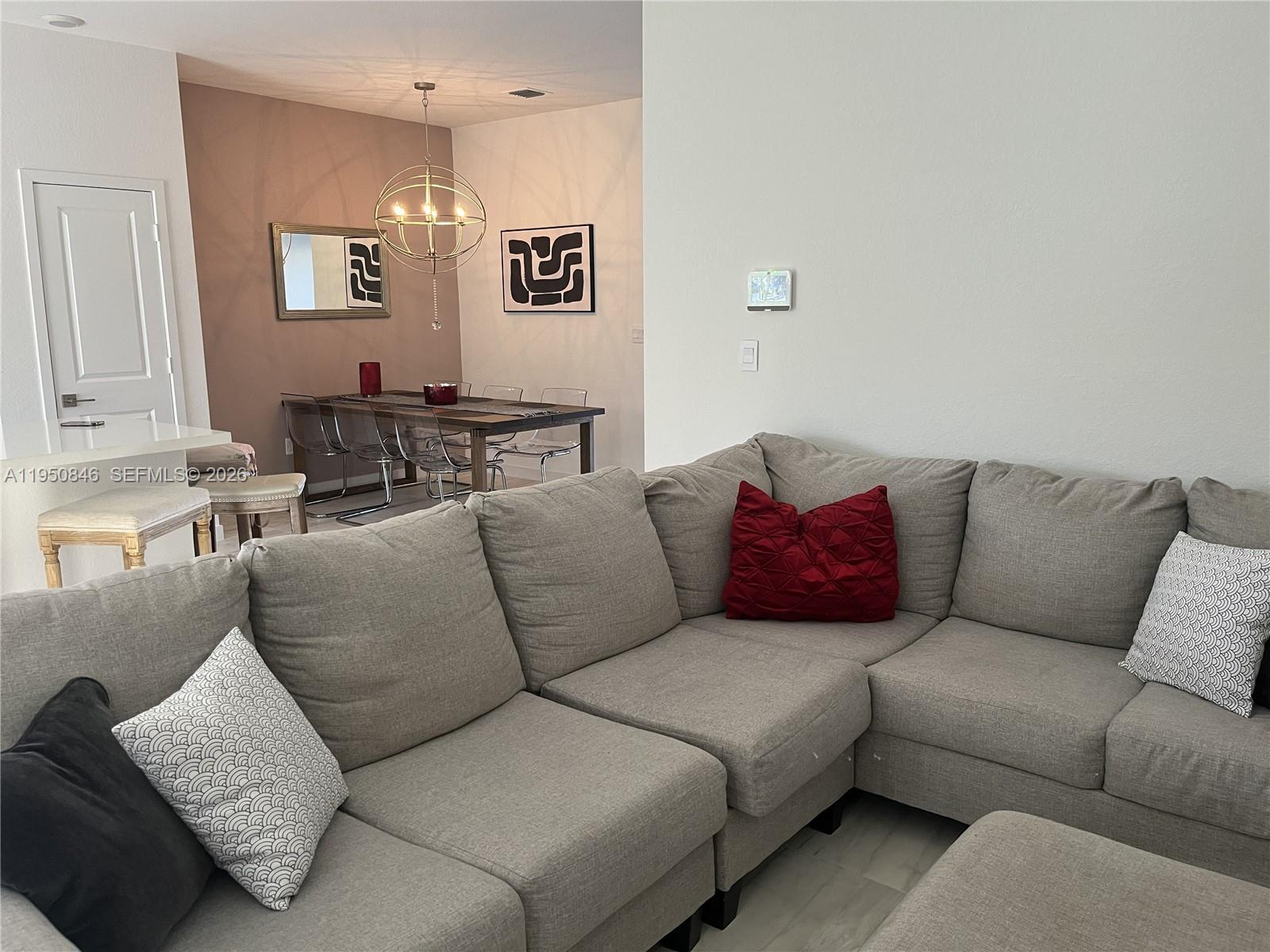 784 Southeast 19th Street, Unit 784 Homestead, FL 33034 - Photo 8 of 22 a living room with furniture