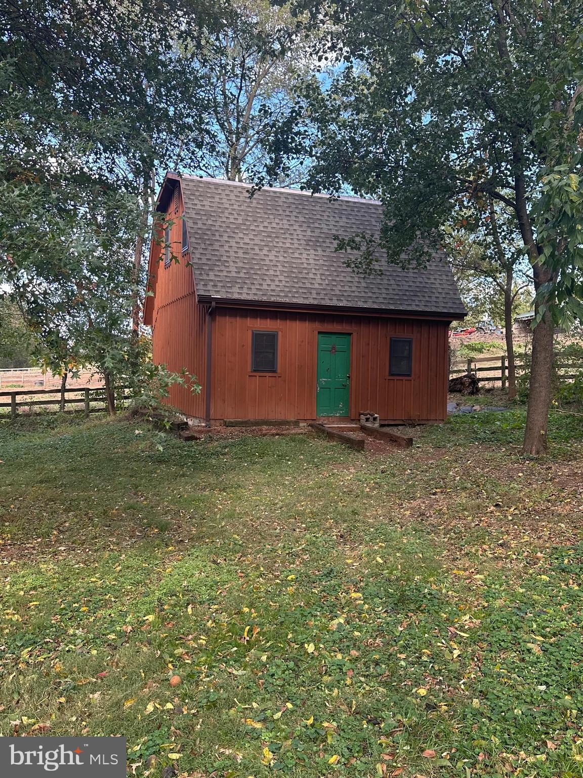 18524 Beallsville Road Poolesville, MD 20837 - Photo 2 of 7 a front view of house with yard and trees