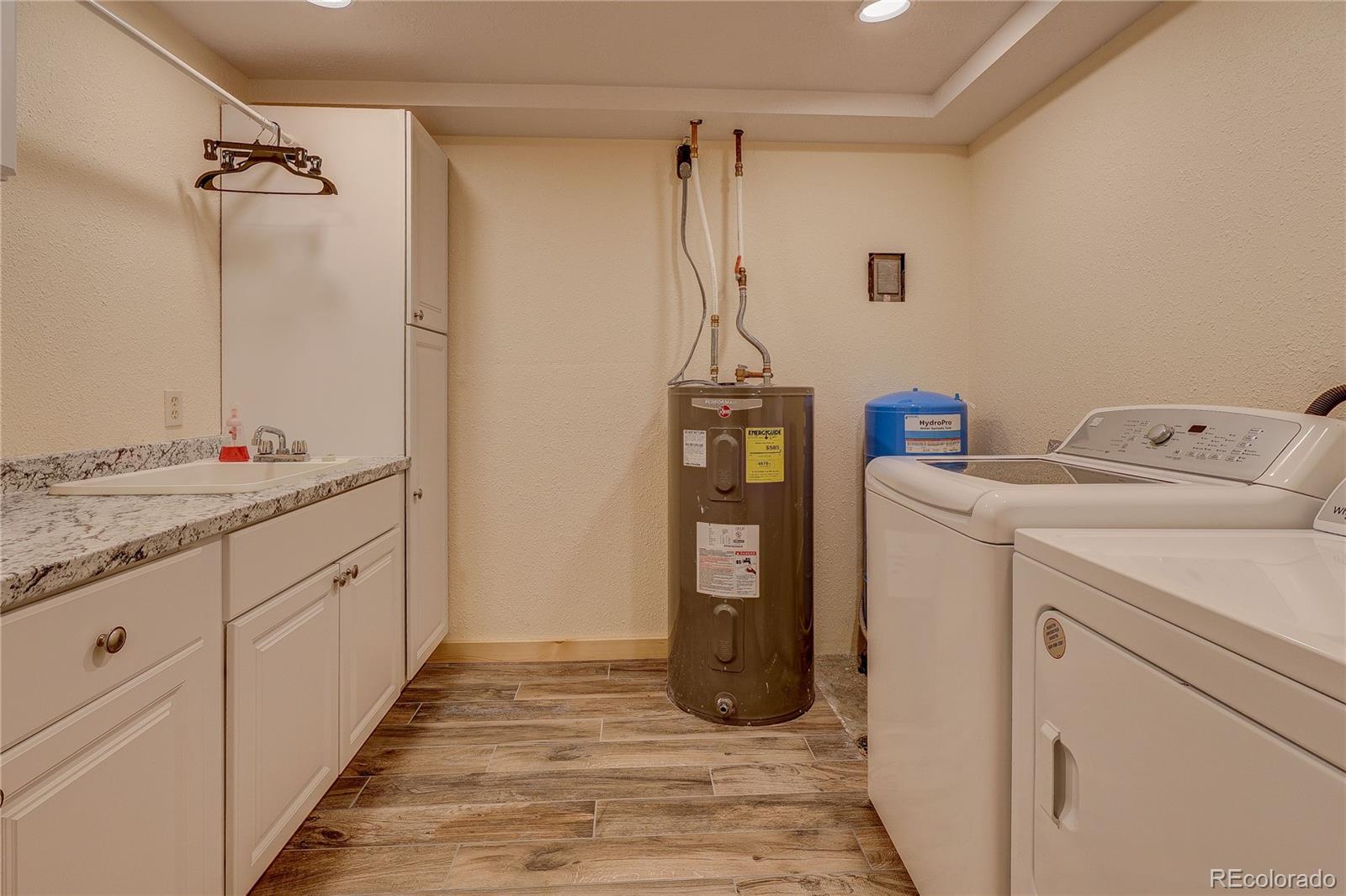 11142 Conifer Mountain Road Conifer, CO 80433 - Photo 36 of 50 a room with storage and utility