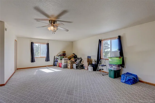 a view of workspace with wooden floor