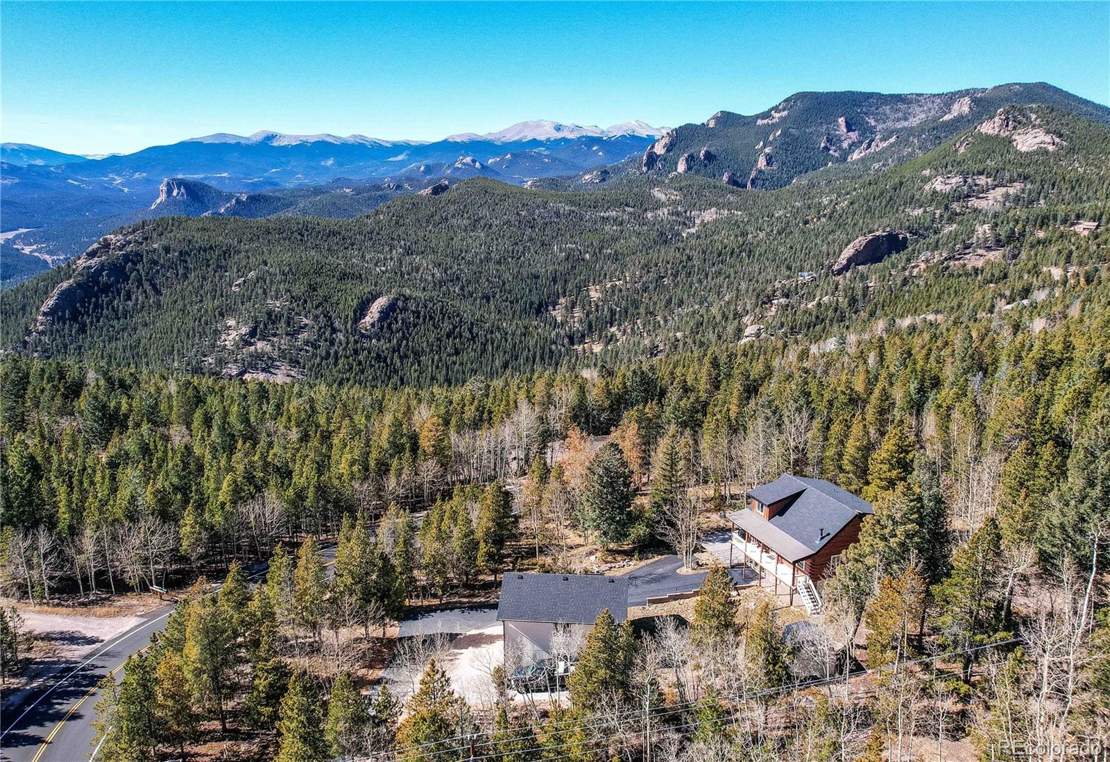 11142 Conifer Mountain Road Conifer, CO 80433 - Photo 5 of 50 an aerial view of a house