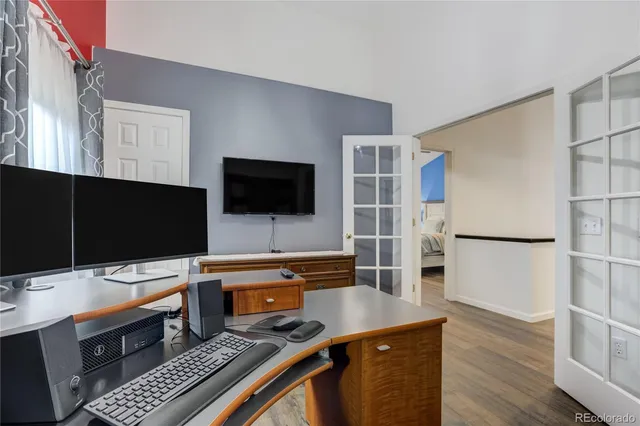 a room with furniture and a flat screen tv