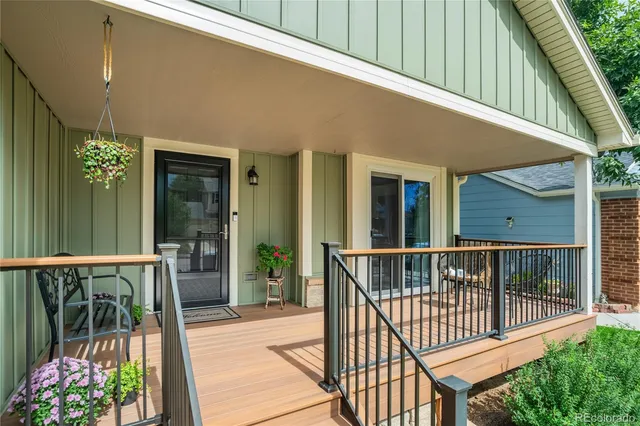 a view of a house with porch and wooden floor