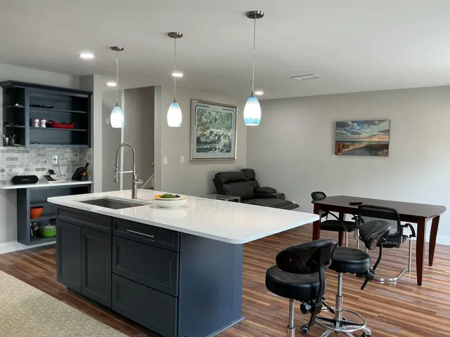 a bathroom with a toilet and a sink