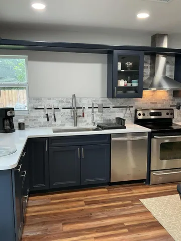 a view of a livingroom with an empty space and a window