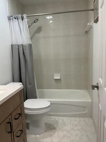 a kitchen with a table chairs and a stove