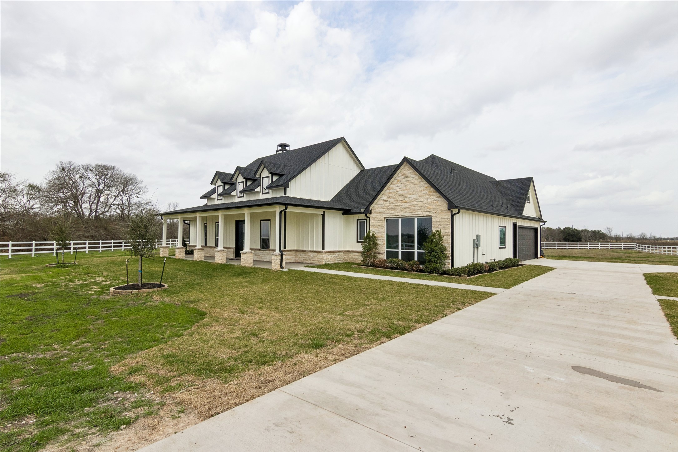 5766 Ward Bend Road Sealy, TX 77474 - Photo 3 of 45 a front view of a house with a yard