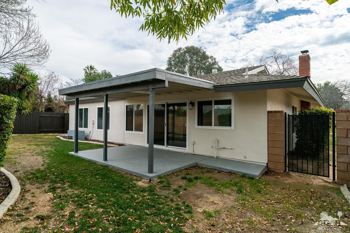 6987 Manhattan Drive Riverside, CA 92506 - Photo 24 of 28 a view of a house with backyard