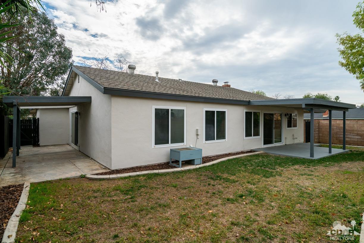 6987 Manhattan Drive Riverside, CA 92506 - Photo 27 of 28 front view of house with a yard